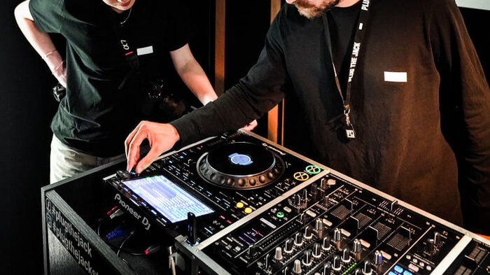 Two Plug The Jack DJs practicing.